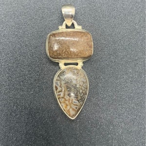 High quality dinosaur bone .925 sterling silver pendant