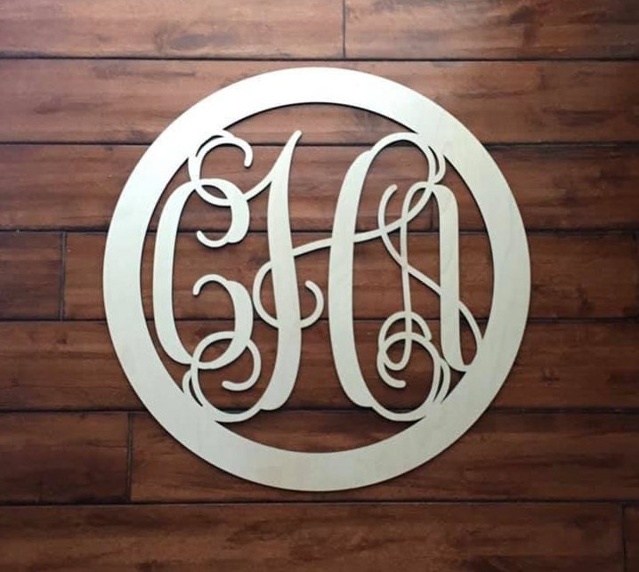 initials insignia cutout leather slides