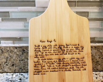 Medium size Paddle  Laser Engraved cutting board with a handwritten recipe