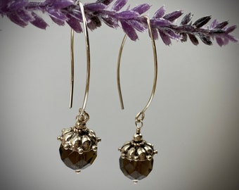 Smokey quartz and sterling silver earrings. Smokey quartz earrings. 10mm quartz. Sterling silver bead caps accenting smokey quartz beads.