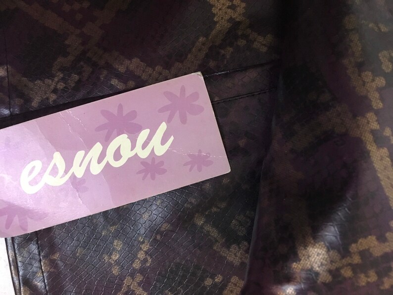 snakeskin bell bottom pants