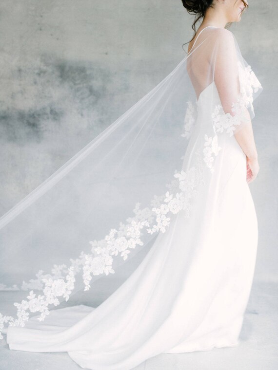 lace cape wedding dress
