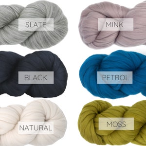 May include: Six skeins of yarn in different colors: slate, mink, black, petrol, natural, and moss.