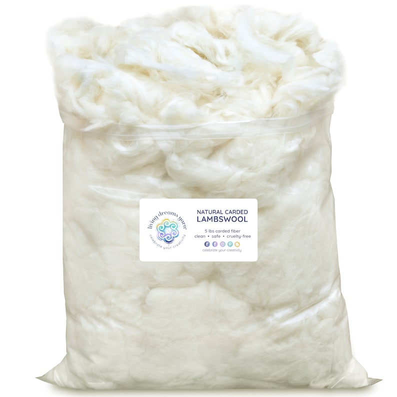 May include: A white plastic bag filled with 5 pounds of natural carded lambswool fiber. The bag has a label that reads "Natural Carded Lambswool" and "5 lbs carded fiber clean safe cruelty-free celebrate your creativity".