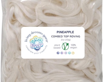 May include: A bag of white pineapple combed top roving yarn, 2 ounces (50 grams), plant-based and 100% vegan. The label says "Living Dreams Yarn" and "Celebrate Your Creativity".