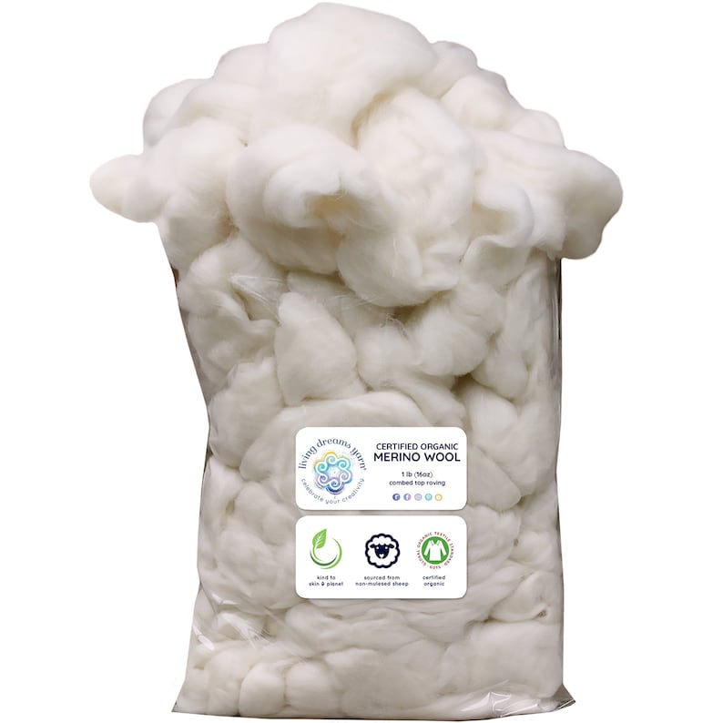 May include: A white plastic bag filled with white, fluffy, certified organic merino wool. The bag has a label that reads "Certified Organic Merino Wool 1 lb (16oz) combed top roving".