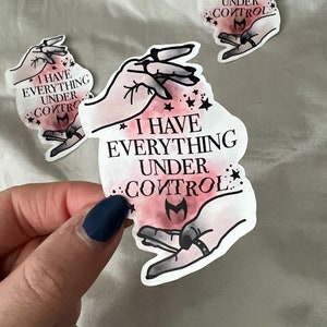 May include: Three stickers with a pink watercolor background and black outlines. The stickers feature a pair of hands with stars and the text "I have everything under control".