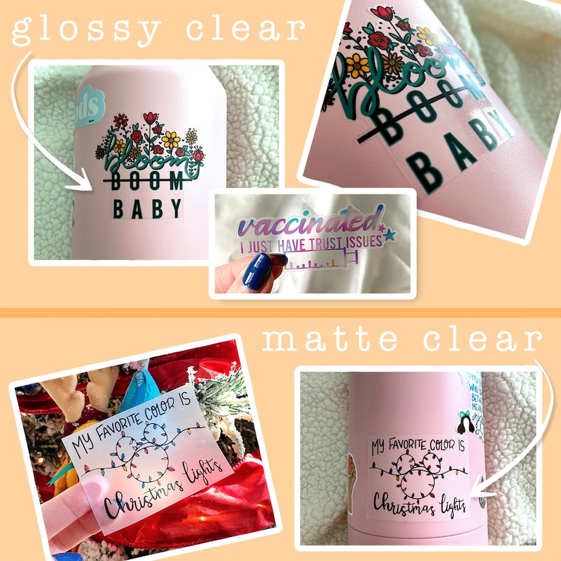 May include: Two images showing the difference between glossy and matte clear vinyl stickers. The glossy sticker is on a pink water bottle and says "Bloom Boom Baby" with flowers. The matte sticker is on a pink water bottle and says "My favorite color is Christmas lights" with a string of lights.