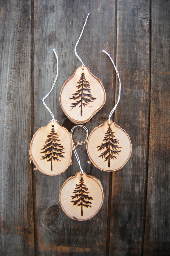 Items similar to Wood burned Christmas tree ornaments northern fir
