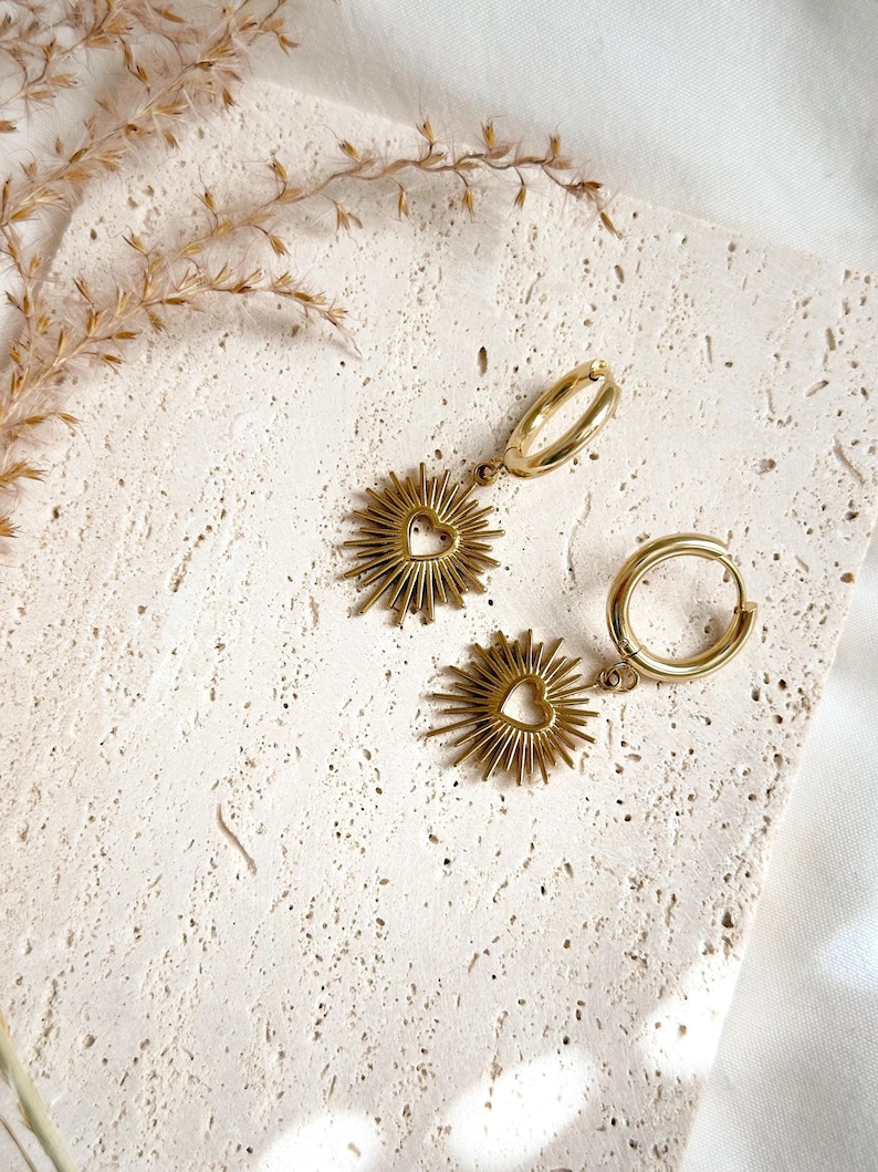 Gold sacred heart pendant earrings