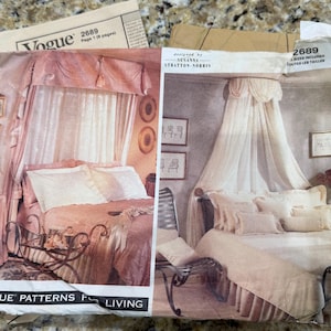 May include: Two vintage Vogue sewing patterns for home decor. The patterns feature images of a bed with a canopy and matching bedding in shades of pink and cream. The pattern number 2689 is visible on the cover.