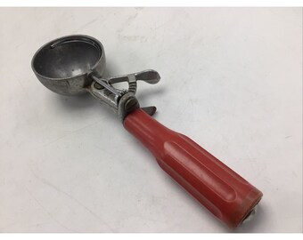 Progressus ijsschep rood handvat mechanisch vintage