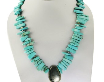 Handmade 17.75” blue necklace: Turquoise, titanium druzy, pyrite, nickel, silver.