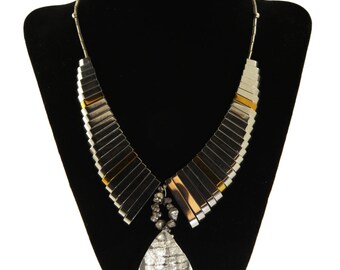 Titanium hematite and crystal silver necklace. 22” length.