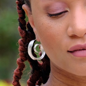 Curly spiral earrings, sterling silver earrings. silversmith earrings