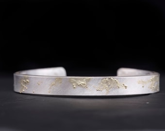 Brazalete rígido para hombre en plata de ley y oro de 14 quilates