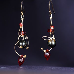 Red garnet, gray Tahitian pearl, and gold filled dangle earrings