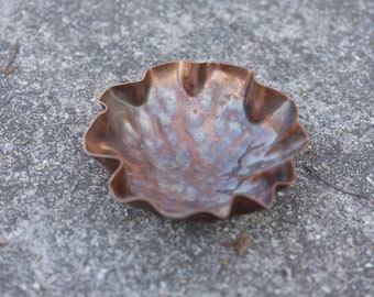 Rustic small copper bowl with dark fire patina