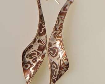 Silver and copper mokume gane anticlastic earrings, long