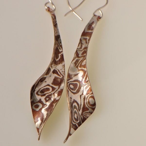 Silver and copper mokume gane anticlastic earrings, long