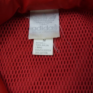Vintage Adidas Packable capucha chaqueta ligera hombres medio rojo blanco negro imagen 6
