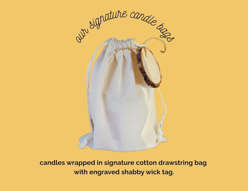 May include: A natural canvas drawstring bag with a wooden tag. The bag is labeled "our signature candle bags" and contains candles. The tag reads "candles wrapped in signature cotton drawstring bag with engraved shabby wick tag."