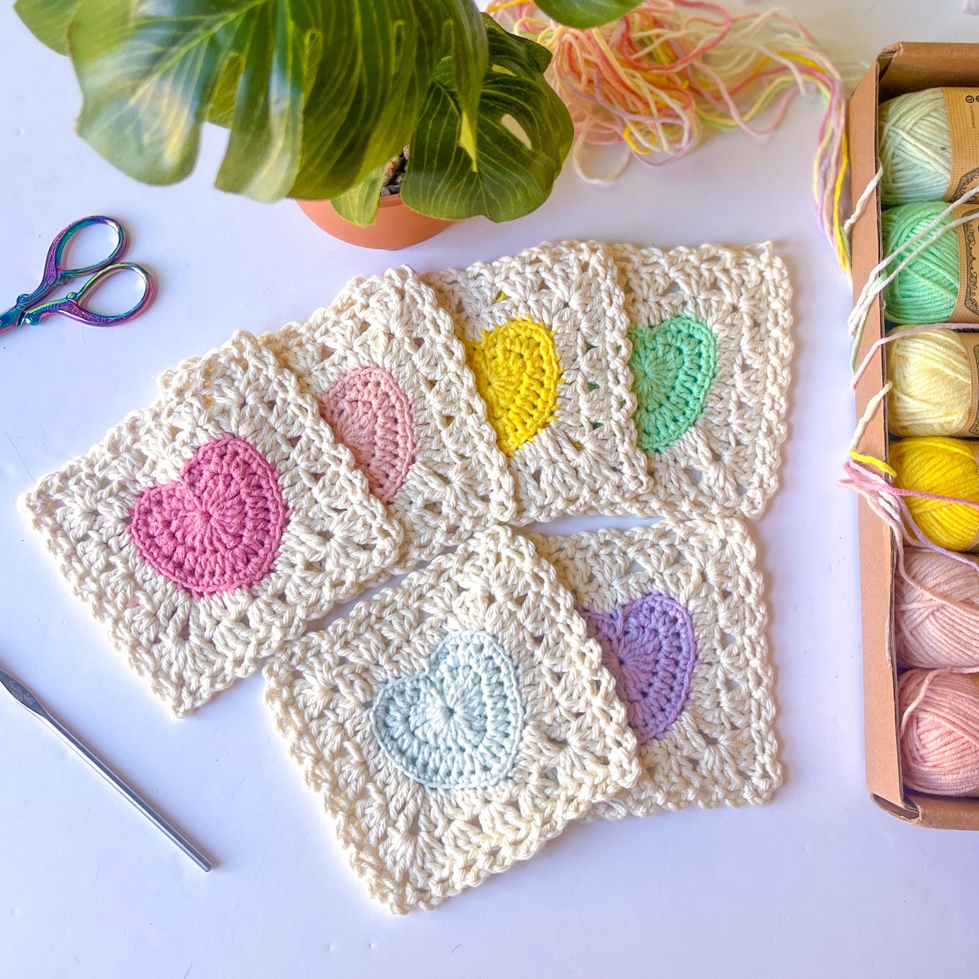 39 Heart Granny Square Crochet Patterns for Blankets, Bags, and Sweet Motifs 14 Lacy Heart Granny Square Crochet Pattern: Valentine's Day