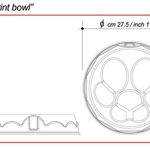 Puede incluir: Un dibujo en blanco y negro de un "Foodprint bowl" con un di&aacute;metro de 27,5 cm (11 pulgadas). El bol tiene un dise&ntilde;o &uacute;nico con m&uacute;ltiples compartimentos.