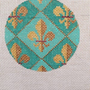 May include: A round, teal and gold needlepoint ornament with a fleur-de-lis design.