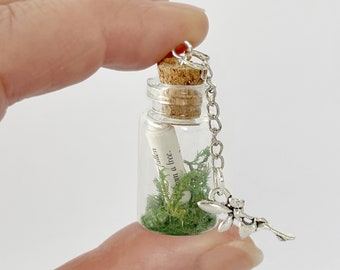 Fairy spell bottle with moss and fairy charm