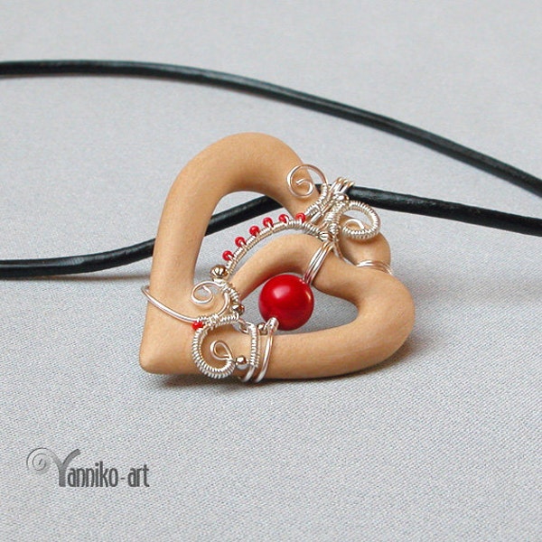 Heart wooden pendant with red genuine coral bead