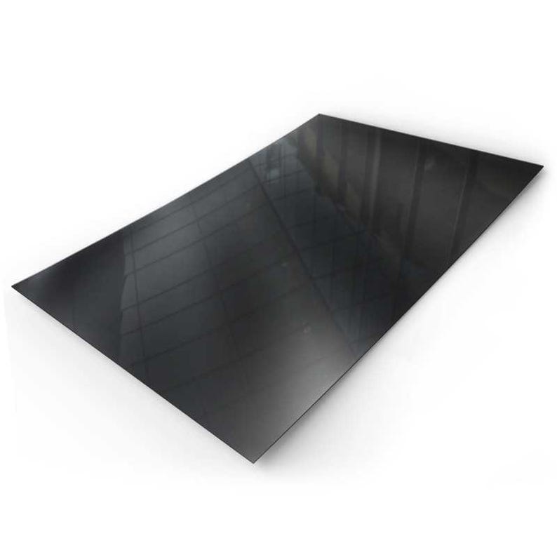 May include: A black sheet of acrylic plastic with a glossy finish.