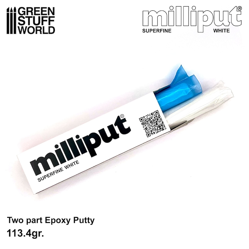 May include: A white box with the text "milliput superfine white" and a QR code. The box contains two tubes of white epoxy putty, one in a blue plastic wrapper and the other in a white paper wrapper. The text "Two part Epoxy Putty 113.4gr." is below the box.