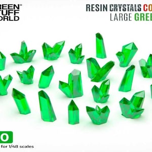 May include: A collection of twenty large, green resin crystals in various shapes, suitable for 1/48 scale models. The crystals are faceted and translucent, with the text "RESIN CRYSTALS COLORS LARGE GREEN" and "x20" visible.