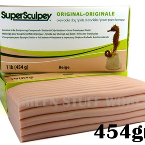 May include: A beige block of Super Sculpey oven-bake clay, weighing 1 lb (454 g). The clay is packaged in a box with a seahorse illustration and the text "ORIGINAL ORIGINALE".