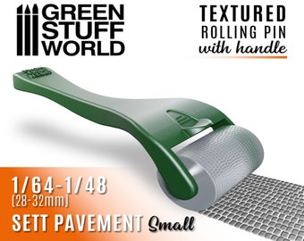 May include: Green textured rolling pin with handle for creating 1/64-1/48 (28-32mm) sett pavement.  The rolling pin is green with a gray textured roller.  The text "GREEN STUFF WORLD" is in black text on a white background.  The text "TEXTURED ROLLING PIN with handle" is in black text on a white background.  The text "1/64-1/48 (28-32mm) SETT PAVEMENT Small" is in black text on an orange background.