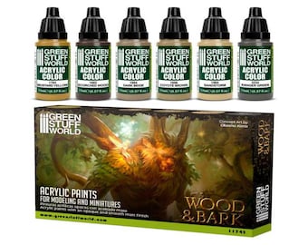 Könnte beinhalten: Satz mit sechs 17 ml Flaschen Green Stuff World Acrylfarbe. Die Flaschen sind mit dem Farbnamen und der Nummer beschriftet. Die Farben sind Senfgelb, Verbranntes Holz, Dunkelbeige, Coyote Braun, Sandsturm und Ranger Grün. Die Flaschen sind in einer Reihe auf einer Schachtel mit einem Bild einer Kreatur mit grünem Laub und dem Text "Holz & Rinde" angeordnet.