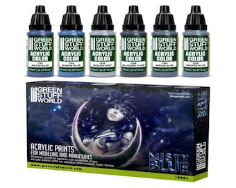 Pode incluir: Um conjunto de seis frascos de tinta acrílica de 0,57 fl oz em tons de azul e cinza. Os frascos são etiquetados como "Green Stuff World Acrylic Color" e têm nomes como "Abyss Blue", "Marine Blue", "Wolven Grey", "Bluegrey Dusk", "Mirage Blue" e "Smoked Blue". O conjunto é embalado em uma caixa com o rosto de uma mulher e as palavras "Misty Blue" nela.