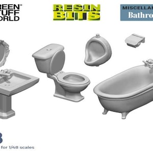 May include: A set of 8 1/48 scale resin bathroom fixtures, including a toilet, sink, bathtub, urinal, and mirror. The set is labeled "Resin Bits" and "Miscellaneous Bathroom".
