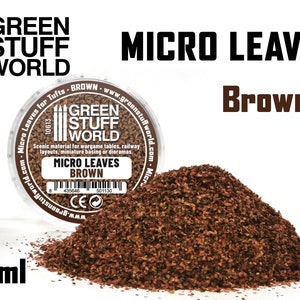May include: A 60ml container of brown micro leaves for model railroading and wargaming. The container is labeled "Green Stuff World" and "Micro Leaves Brown".