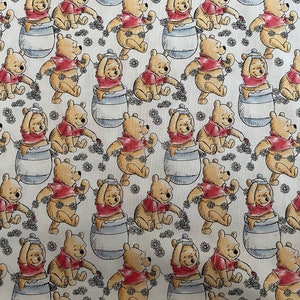 100% cotton fabric Winnie the Pooh Classic Pooh Playing Honey Pot daisy chain sold by the yard, 1/2 yard, and fat quarter FQ **SHIPS QUICK**