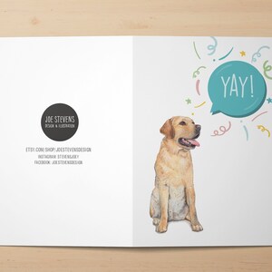 May include: Greeting card featuring a watercolor illustration of a yellow Labrador Retriever with its tongue out. A speech bubble says "YAY!" with colorful confetti. The card also includes the designer's logo and social media information.