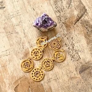 SET 7 CHAKRAS Stainless Steel,Yoga Healing Pendants, Gold Plated, Round Hollow.
