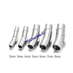 May include: A collection of silver-colored curved magnetic clasps in various sizes, ranging from 2mm to 8mm. The clasps are arranged in a row, with the size measurements clearly labeled below each clasp. The clasps are designed for jewelry making.