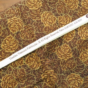 BTY Gilded Pinecone Fabric Brown Quilting Cotton