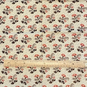Coton matelassé à fleurs rouge-marron, 1 yard