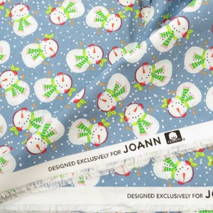 BTY Snowman Toss Fabric Blue Quilting Cotton