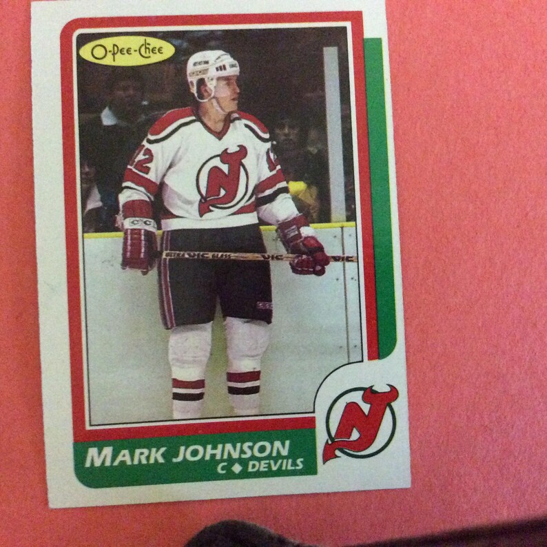 O-Pee-Chee #112 Mark Johnson Hockey 198687