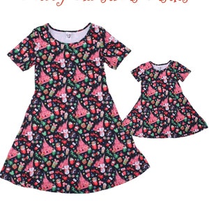 Christmas Disney Castle print dress.  Mommy and Me matching short sleeve dress for women and girls with pockets regular & plus size