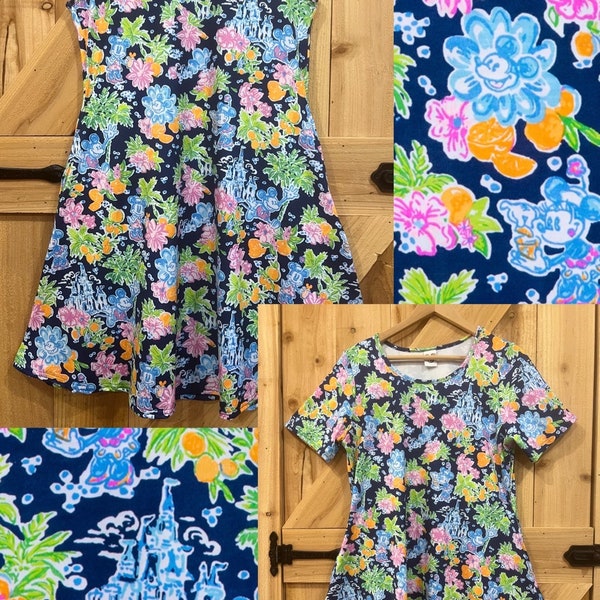 Dress, Disney Minnie Mouse tropical Navy and pink summer print. Short sleeve and sleeveless, has pockets Ready To Ship regular and plus size